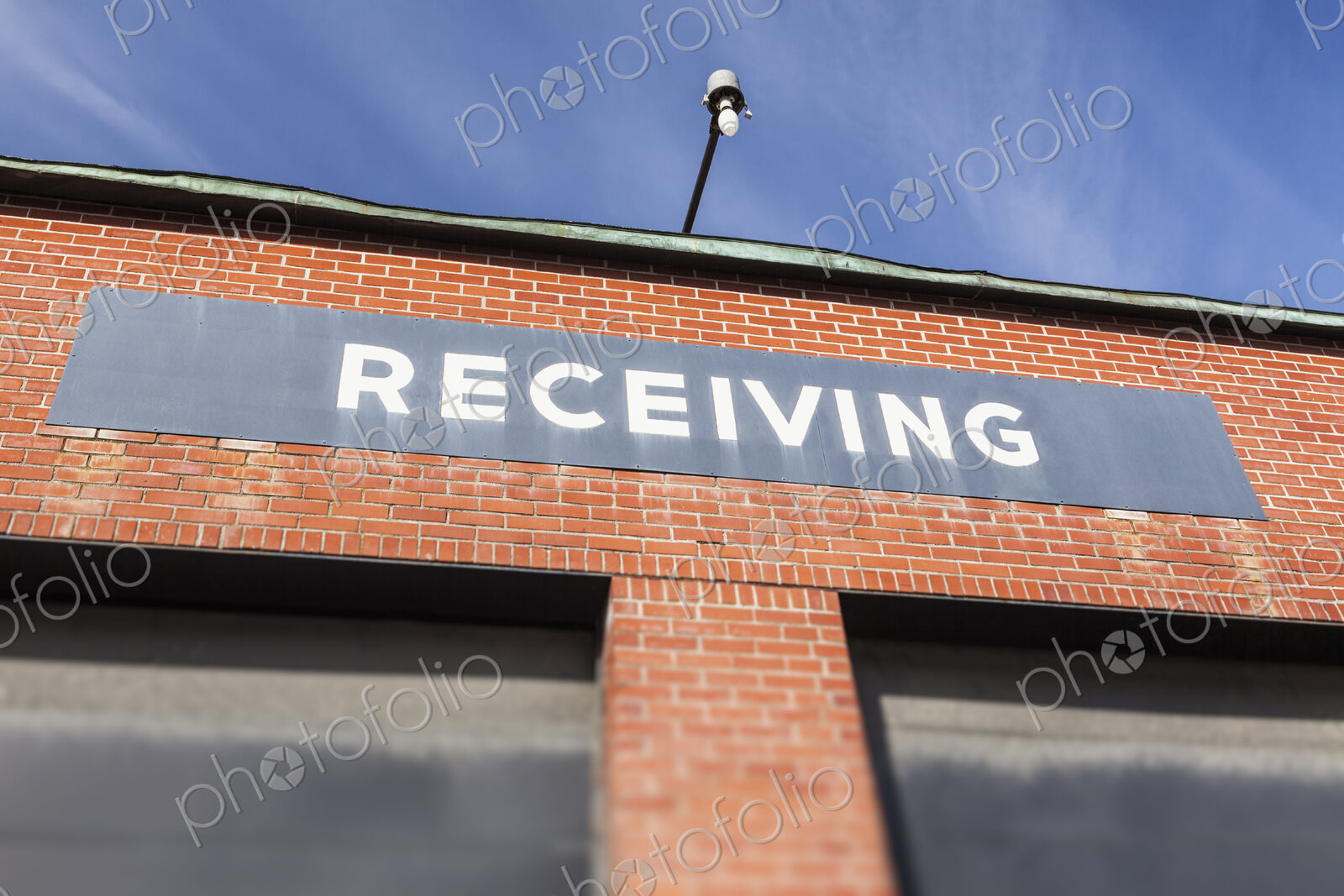 The Receiving loading bay in an industrial building, a warehouse on the dockside at…