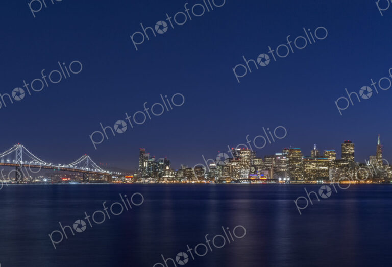 The San Francisco Bay Bridge & Downtown Skyline at Twilight