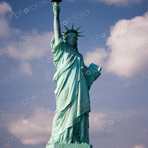 The Statue of Liberty is a national symbol and stands overlooking New York harbour on…