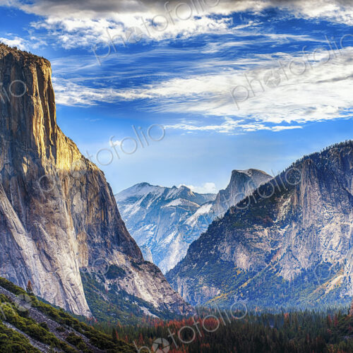 The Tunnel View in Yosemite National park, steep cliffs and mountains towering over… The Tunnel View in Yosemite National park, steep cliffs and mountains towering over…