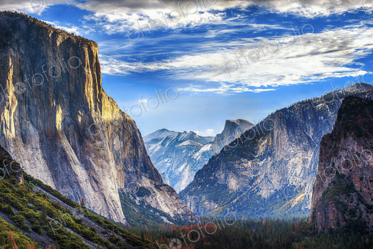 The Tunnel View in Yosemite National park, steep cliffs and mountains towering over…