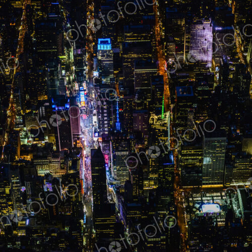 The city of New York City, Manhattan, aerial view at night. The city of New York City, Manhattan, aerial view at night.