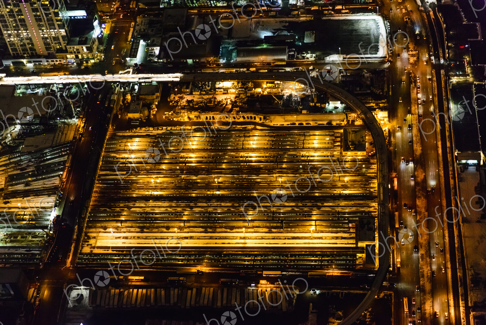 The city of New York City, Manhattan, aerial view at night.