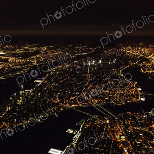 The city of New York City, Manhattan, seen from a high point at night. The city of New York City, Manhattan, seen from a high point at night.