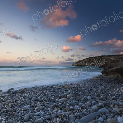 The coastline, bays and cliffs on Cape Agulhas near Arniston at sunset. The coastline, bays and cliffs on Cape Agulhas near Arniston at sunset.