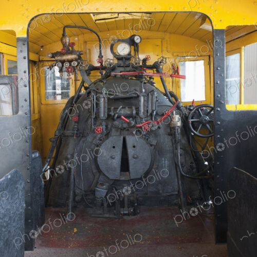 The engine room and control room of a locomotive train.