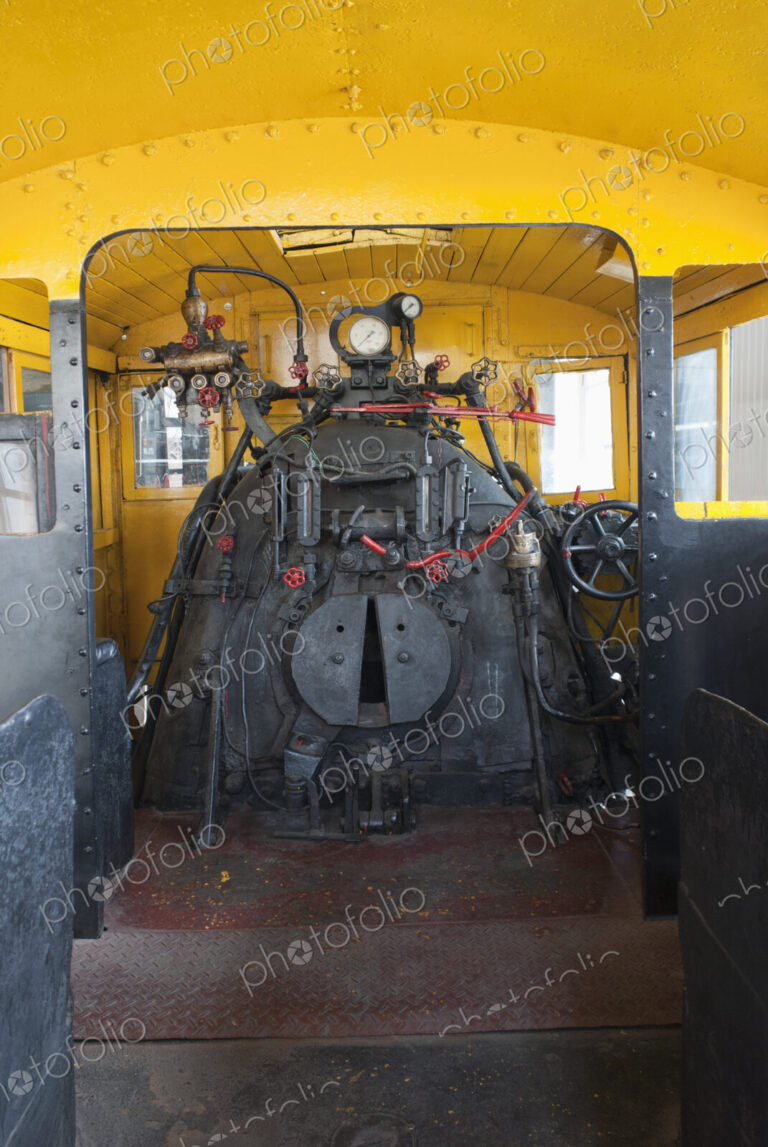 The engine room and control room of a locomotive train.