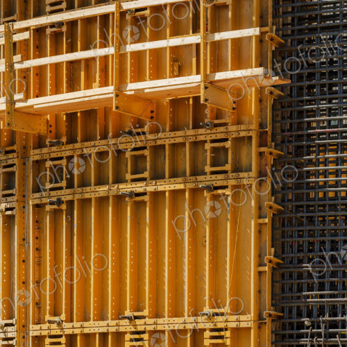 The exterior of a construction site, a high rise building, rebar concrete shuttering…
