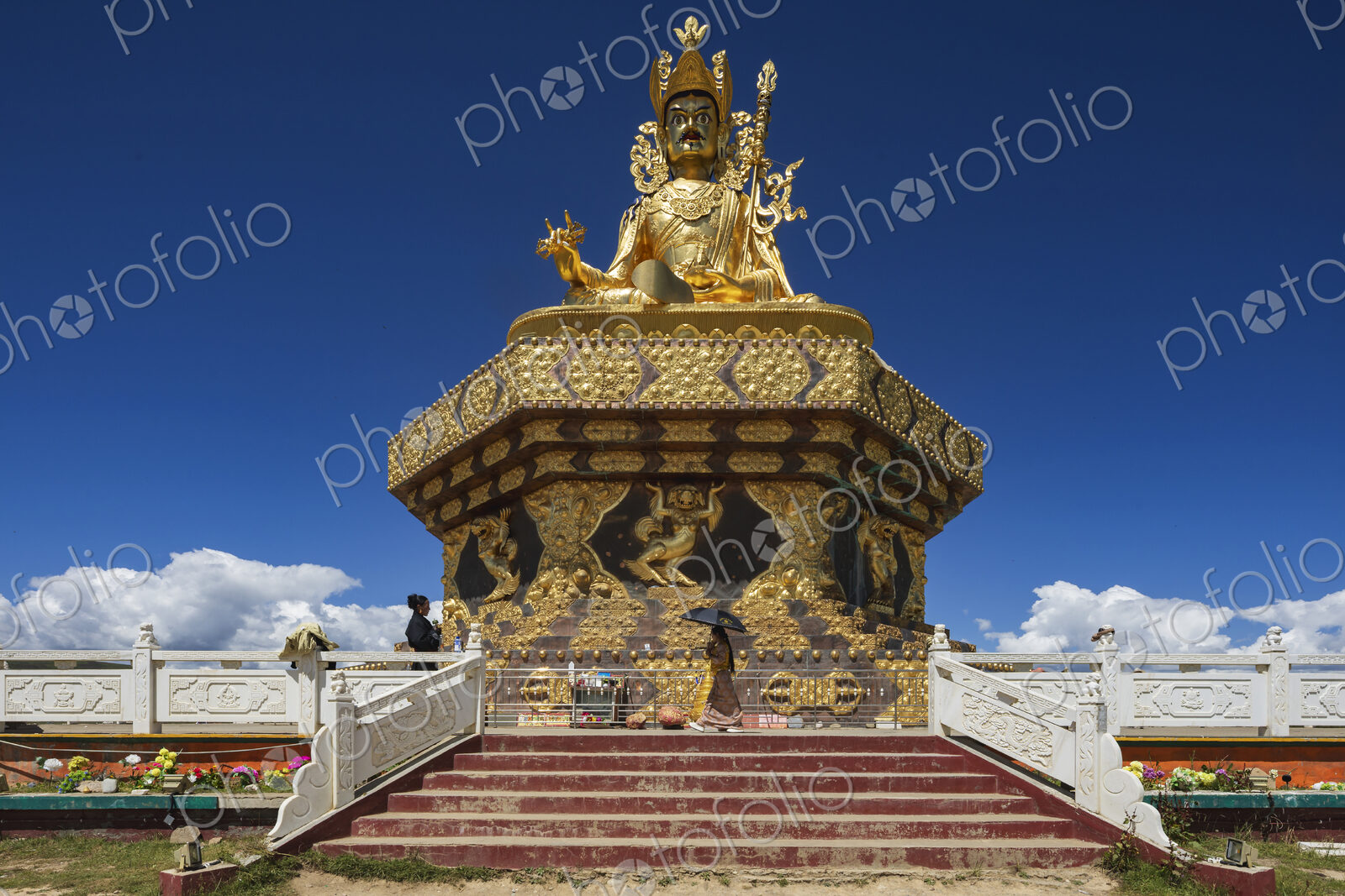 The giant Buddha at Yarchen Gar rises serenely over the vast monastic settlement in…