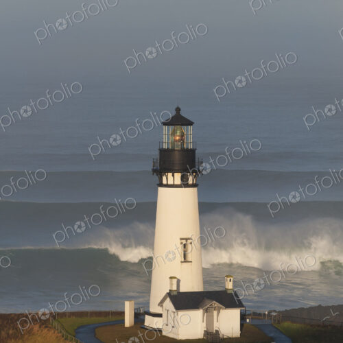 The historic Yaquina Head tower lighthouse on a headland overlooking the Pacific… The historic Yaquina Head tower lighthouse on a headland overlooking the Pacific…