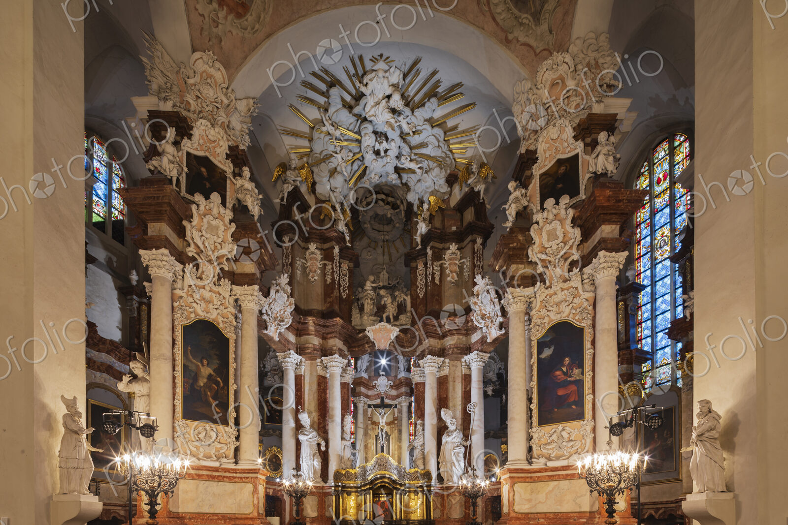 The interior and main altar of St John’s Church, in Baroque style, statues and…