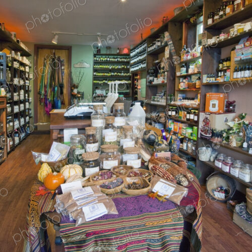 The interior of an apothecary shop, shelves and displays of jars containing plant and… The interior of an apothecary shop, shelves and displays of jars containing plant and…
