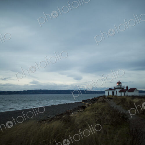 The lighthouse at dusk at Discovery Park in Seattle, WA. The lighthouse at dusk at Discovery Park in Seattle, WA.