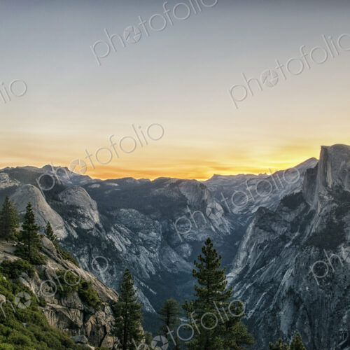 The mountain range in Yosemite valley at sunset, with distinct rock formations and… The mountain range in Yosemite valley at sunset, with distinct rock formations and…