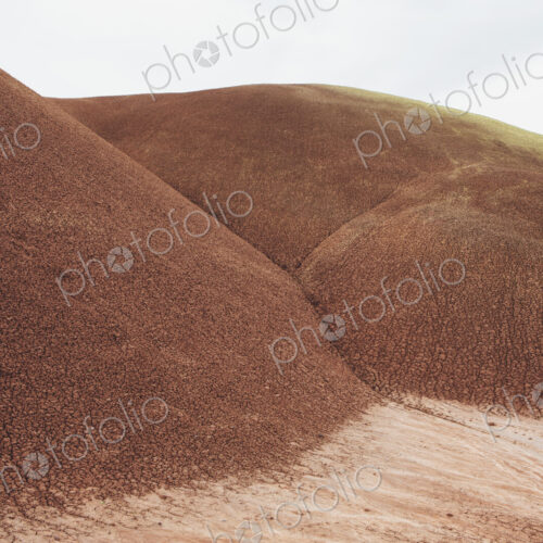 The red rocks of the Painted Desert landscape in the John Day Fossil Beds National…