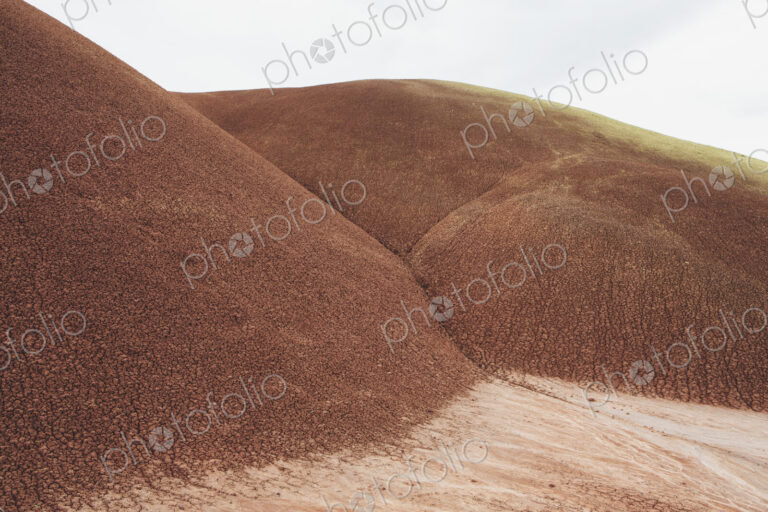 The red rocks of the Painted Desert landscape in the John Day Fossil Beds National…