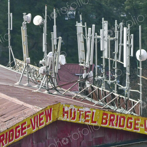 The roof of the hotel Bridge-View in Shimla, with large communications masts, mobile… The roof of the hotel Bridge-View in Shimla, with large communications masts, mobile…