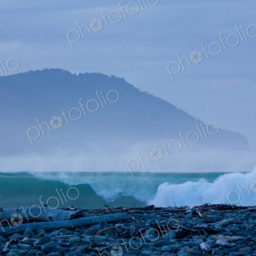 The surf breaking on shore on a beach at the mouth of the River Elwha on Olympic… The surf breaking on shore on a beach at the mouth of the River Elwha on Olympic…