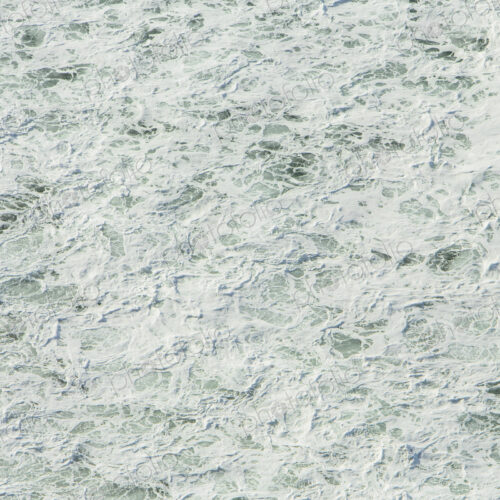 The surface of the Pacific ocean with wave patterns and white water, at Manzanita, Oregon.