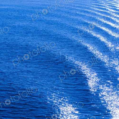 The surface of the ocean, blue water, ripples.