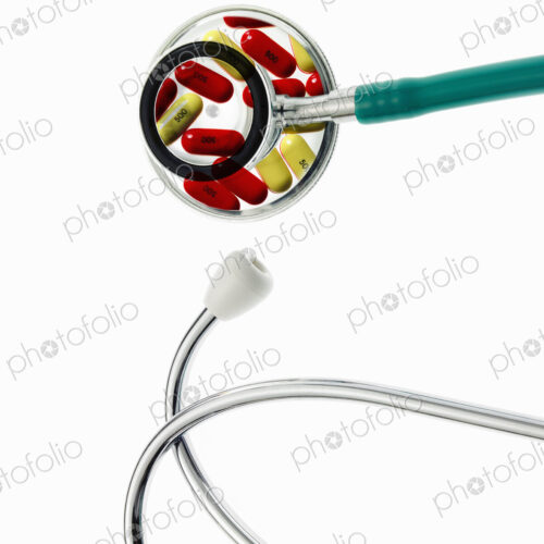 The two parts of a doctor's stethoscope with green tubing, a conceptual illustration… The two parts of a doctor's stethoscope with green tubing, a conceptual illustration…