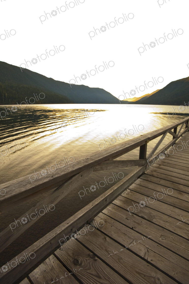 The view at sunset over the water of Lake Crescent, Olympic National Park, Port Angeles