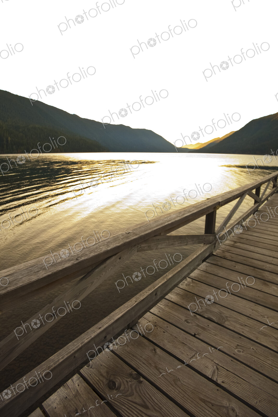 The view at sunset over the water of Lake Crescent, Olympic National Park, Port Angeles