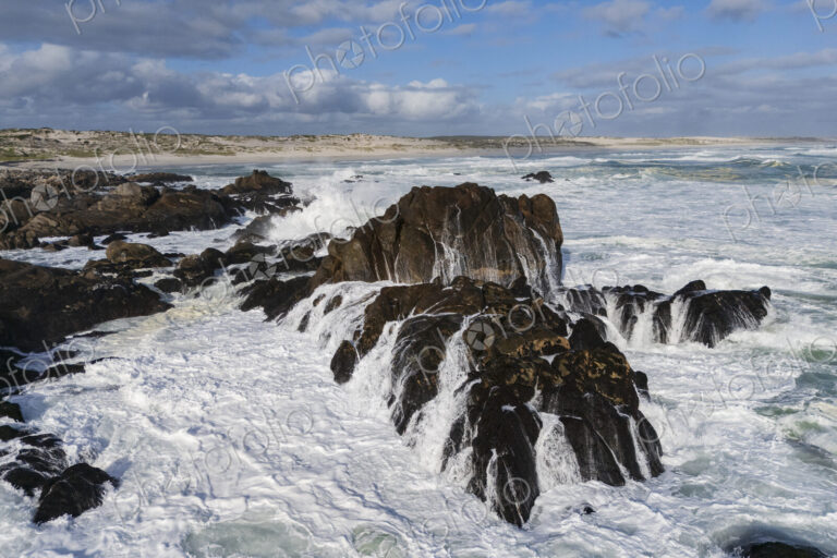 The western cape coastline, Incoming Waves Breaking on Rocks default West Coast…