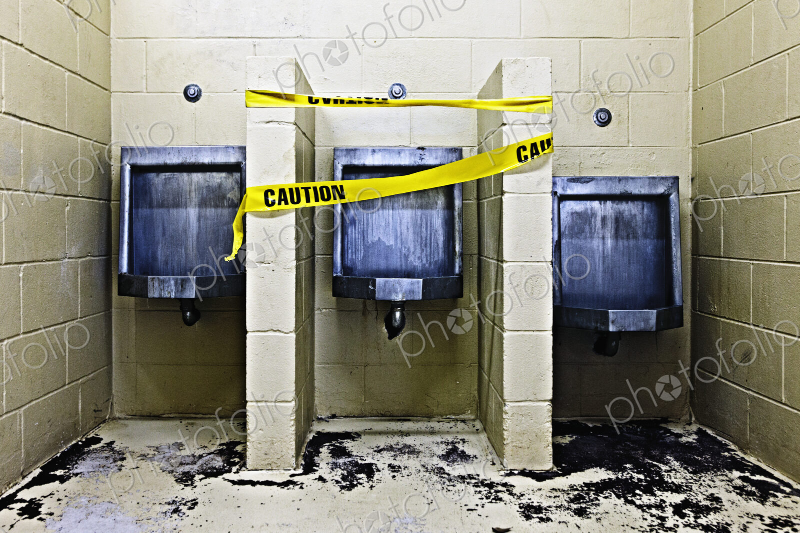 Three Public Urinals in Disrepair