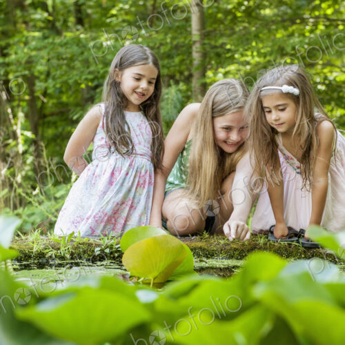 Three girls playing outdoors. Three girls playing outdoors.