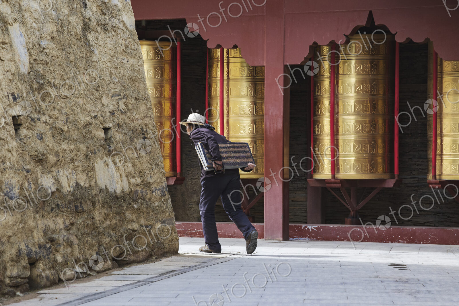 Tibetan Women Carrying inscribed Tablets to be Built into a Mani Wall Tagong, Sichuan…