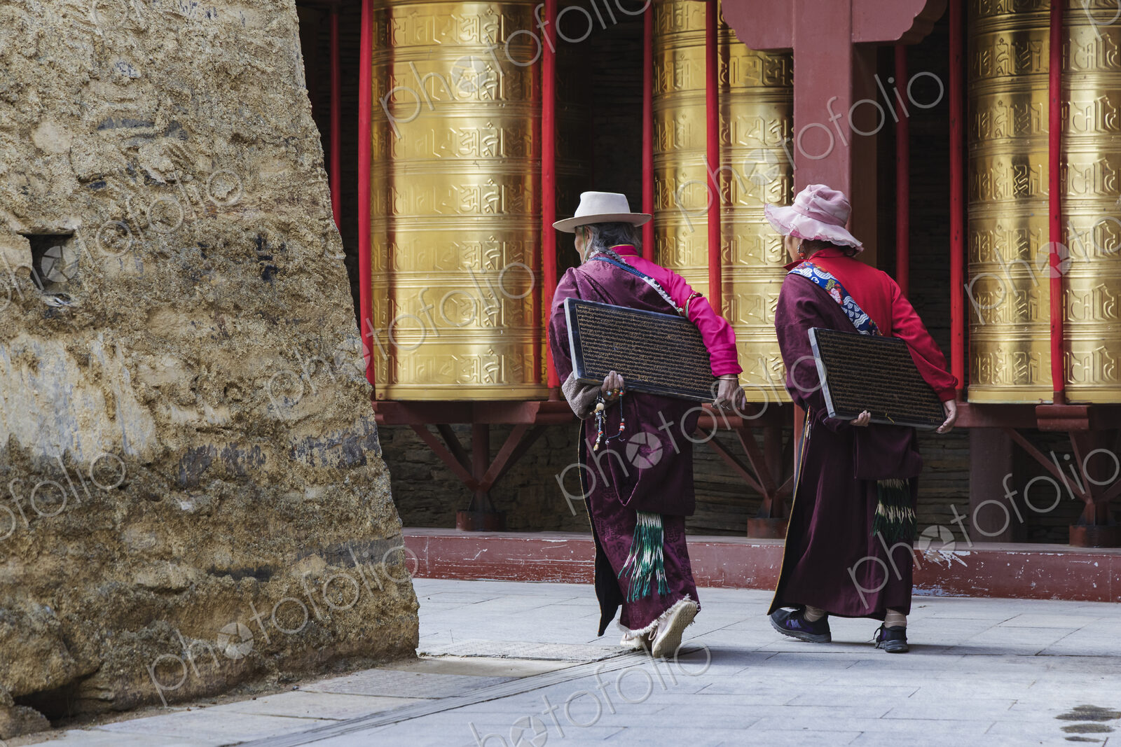 Tibetan Women Carrying inscribed Tablets to be Built into a Mani Wall Tagong, Sichuan…