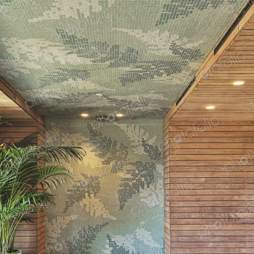 Tiled and wooden wall in shower with potted plant. Tiled and wooden wall in shower with potted plant.