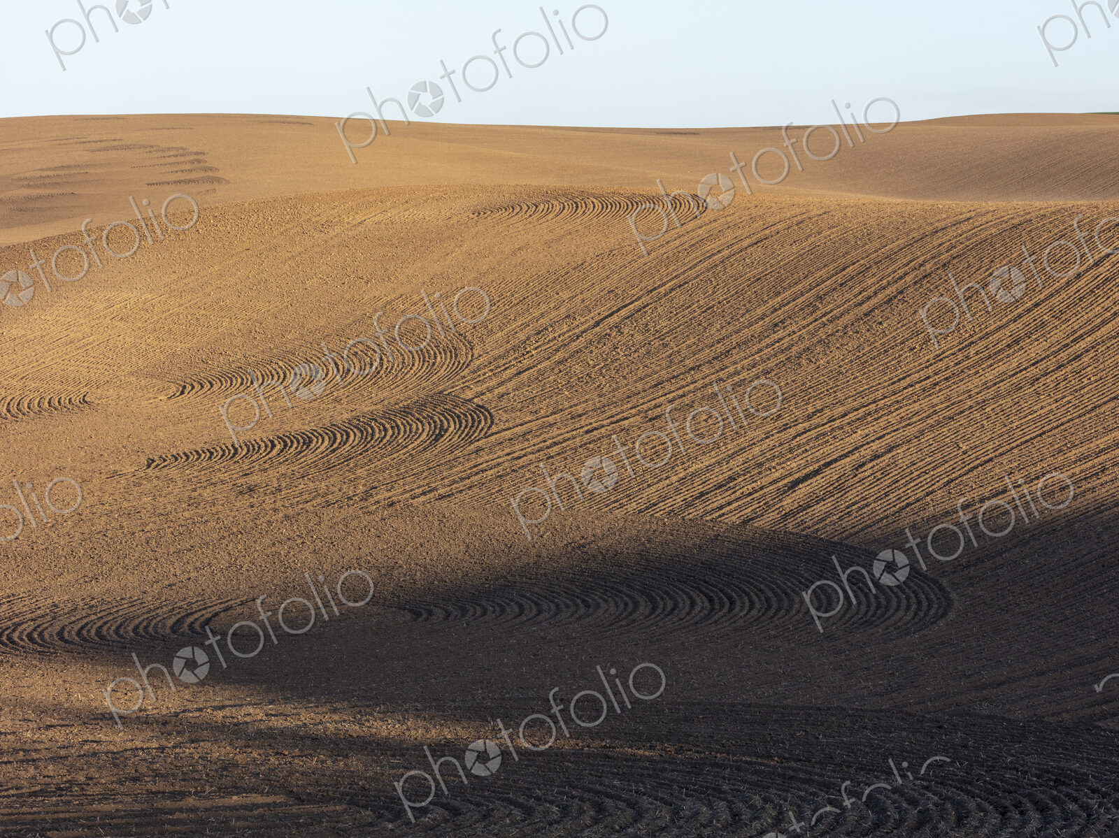 Tilled farmland and rolling hills