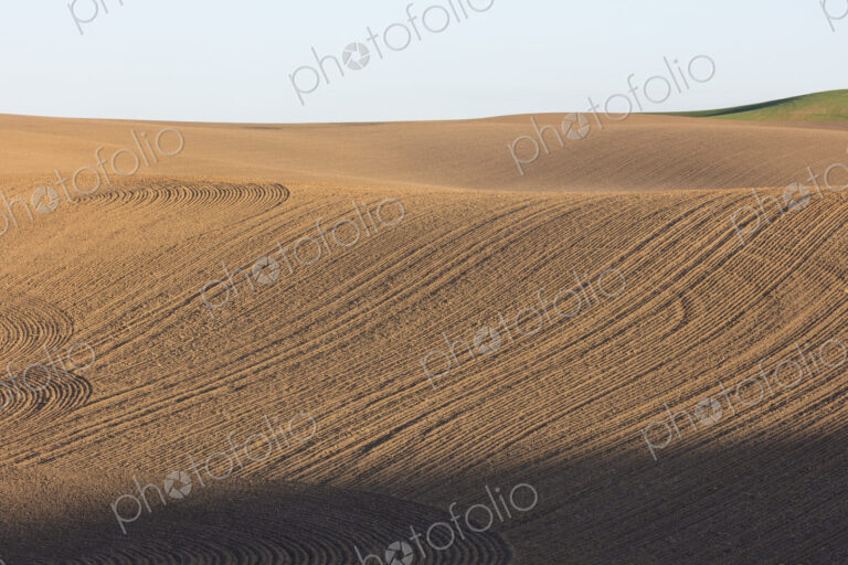 Tilled farmland and rolling hills