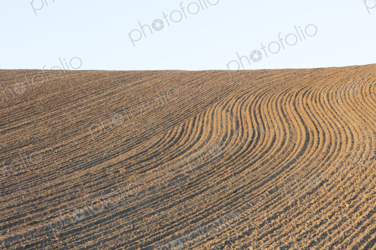 Tilled farmland and rolling hills