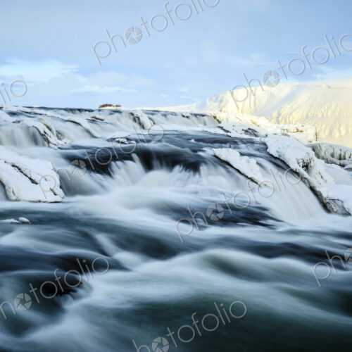 Time lapse view of river flowing over icy rock formations Time lapse view of river flowing over icy rock formations
