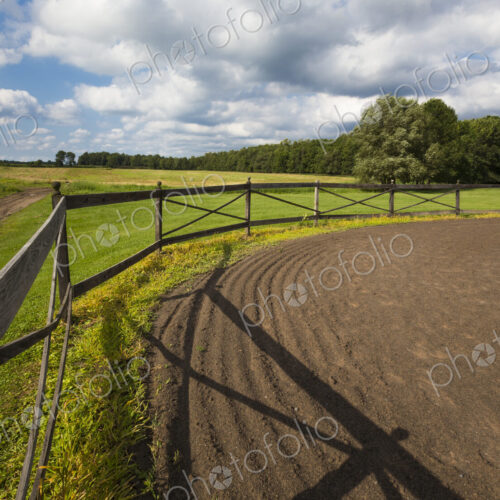 Tire tracks in riding ring on horse farm Tire tracks in riding ring on horse farm