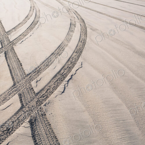 Tire tracks on beach Tire tracks on beach