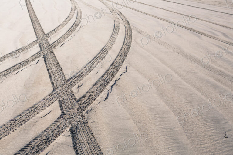 Tire tracks on beach