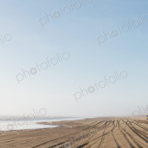 Tire tracks on the soft surface of sand on a beach. Tire tracks on the soft surface of sand on a beach.