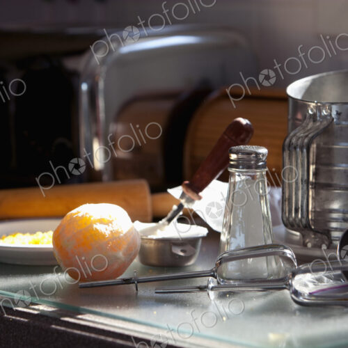 Tools and ingredients for baking on a domestic kitchen counter