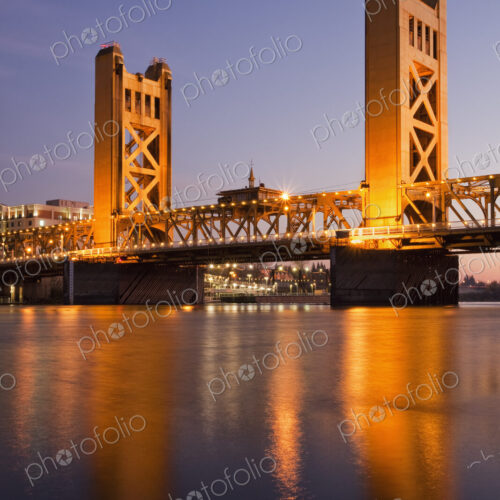 Tower Bridge at sunset, crossing bridge over the Sacramento River Tower Bridge at sunset, crossing bridge over the Sacramento River
