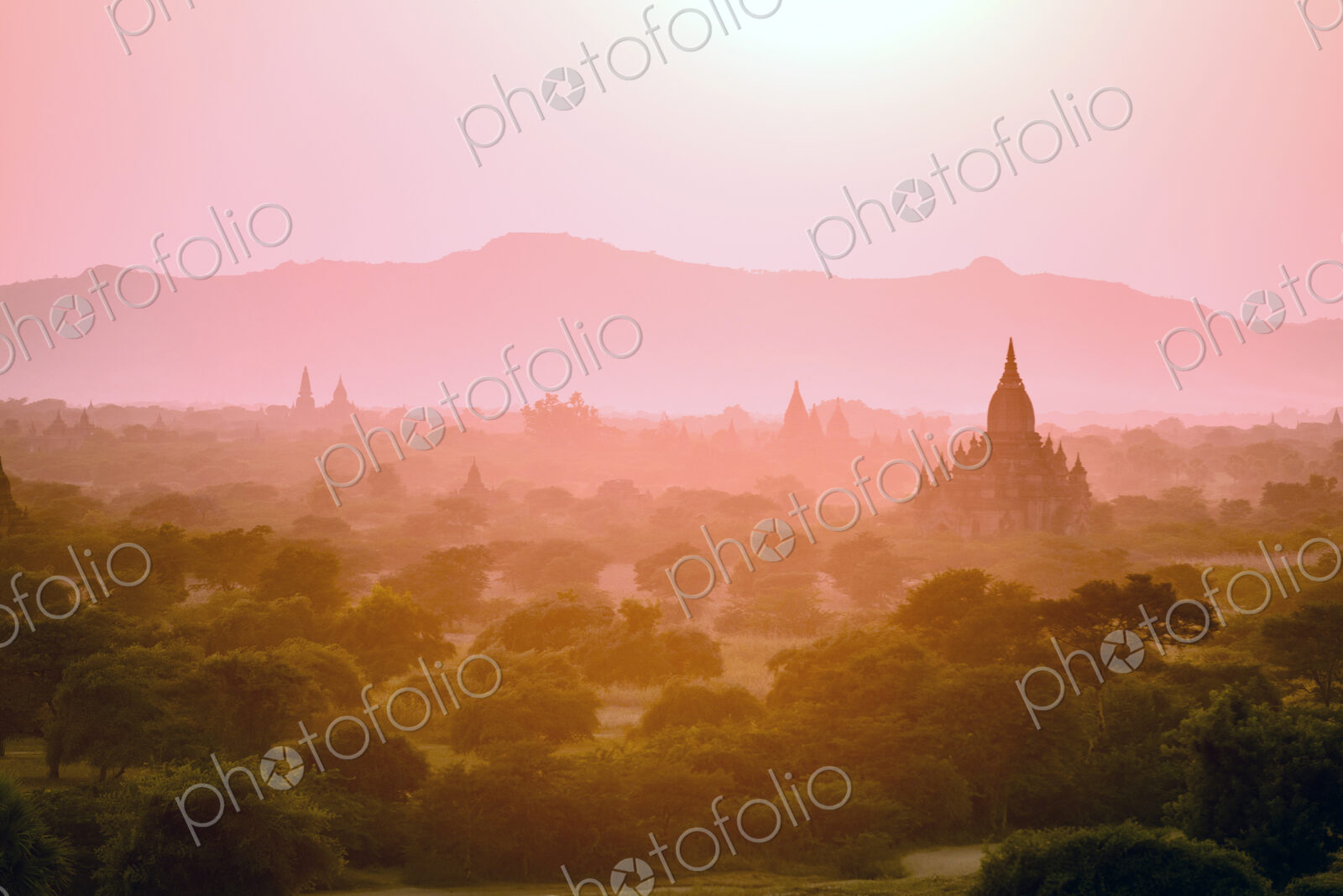 Towers in misty landscape
