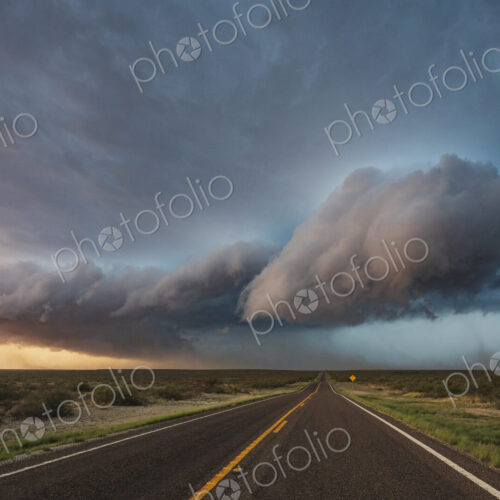 Tracking a Supercell alomg Texas Highway 285, grey cloud formations hovering over the… Tracking a Supercell alomg Texas Highway 285, grey cloud formations hovering over the…