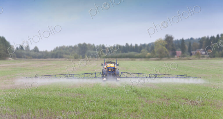 Tractor Spraying Herbicide