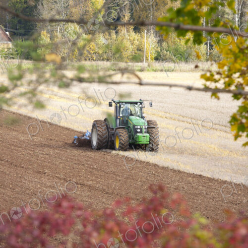 Tractor With an Aerator Tractor With an Aerator