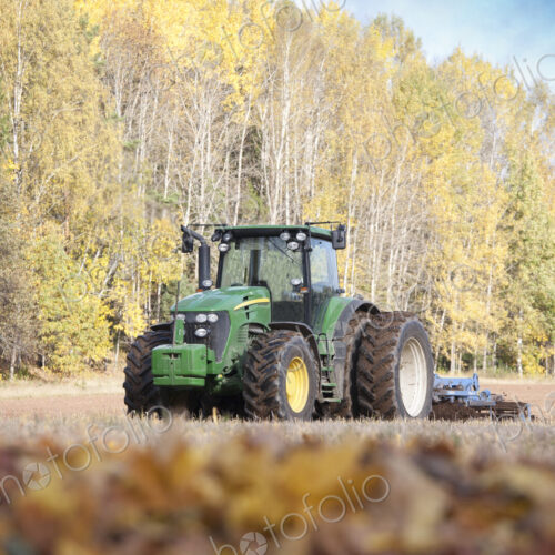 Tractor With an Aerator Tractor With an Aerator