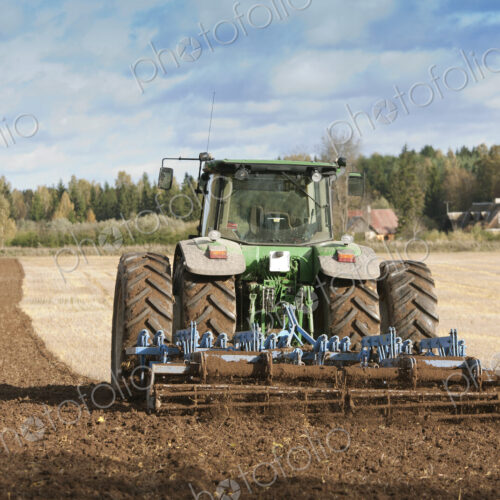 Tractor With an Aerator Tractor With an Aerator