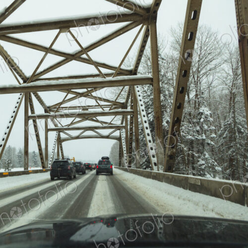 Traffic jam of cars on snowy bridge on Interstate 90, Cle Elum, WA USA Traffic jam of cars on snowy bridge on Interstate 90, Cle Elum, WA USA
